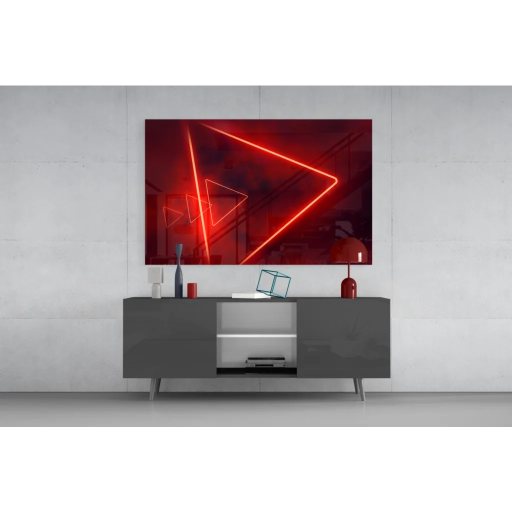 Vibrant red neon triangle glass wall art on gray console table