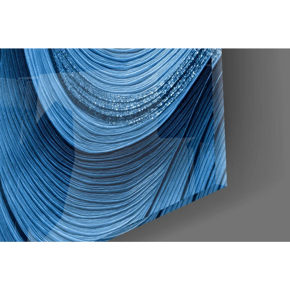 Stunning blue wave glass wall art with curved lines and sparkle