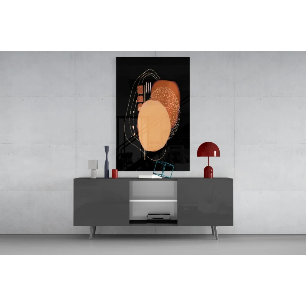 Stunning abstract glass wall art with bold orange gold circles on black