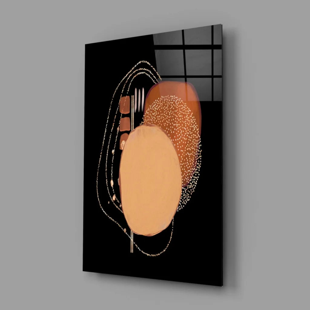 Stunning abstract glass wall art with amber ovals and glittery dots on black