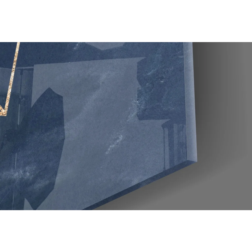 Translucent blue glass wall art with gold accents on navy textured canvas