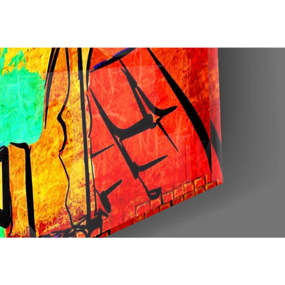 Vibrant glass wall art with bold black graffiti on fiery red, orange, teal background