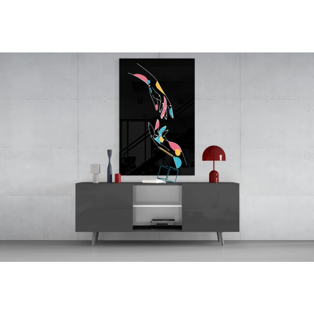 Vibrant glass wall art with bold colorful hands on black background