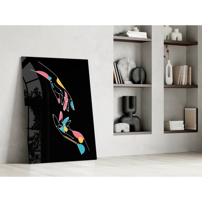 Vibrant glass wall art with bold colorful hands on black canvas