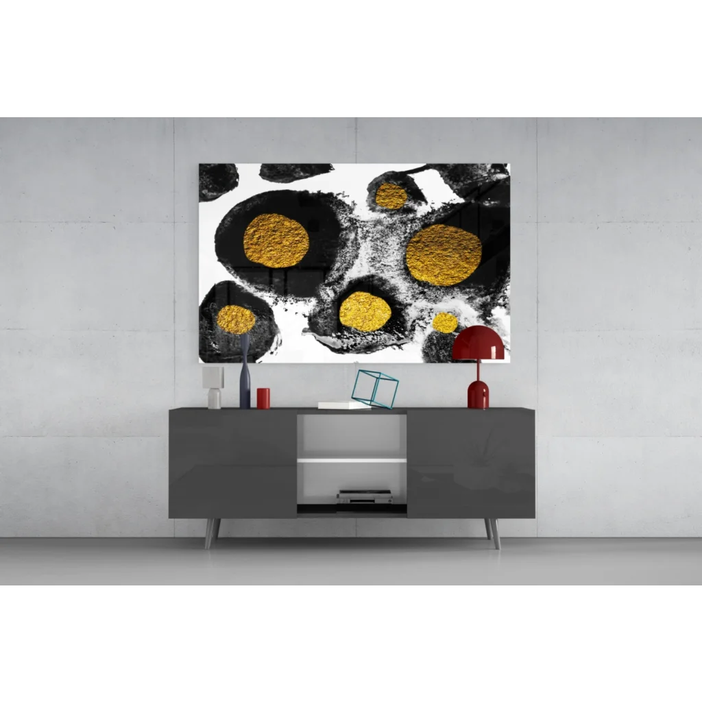 Abstract black and white glass wall art with gold circular accents