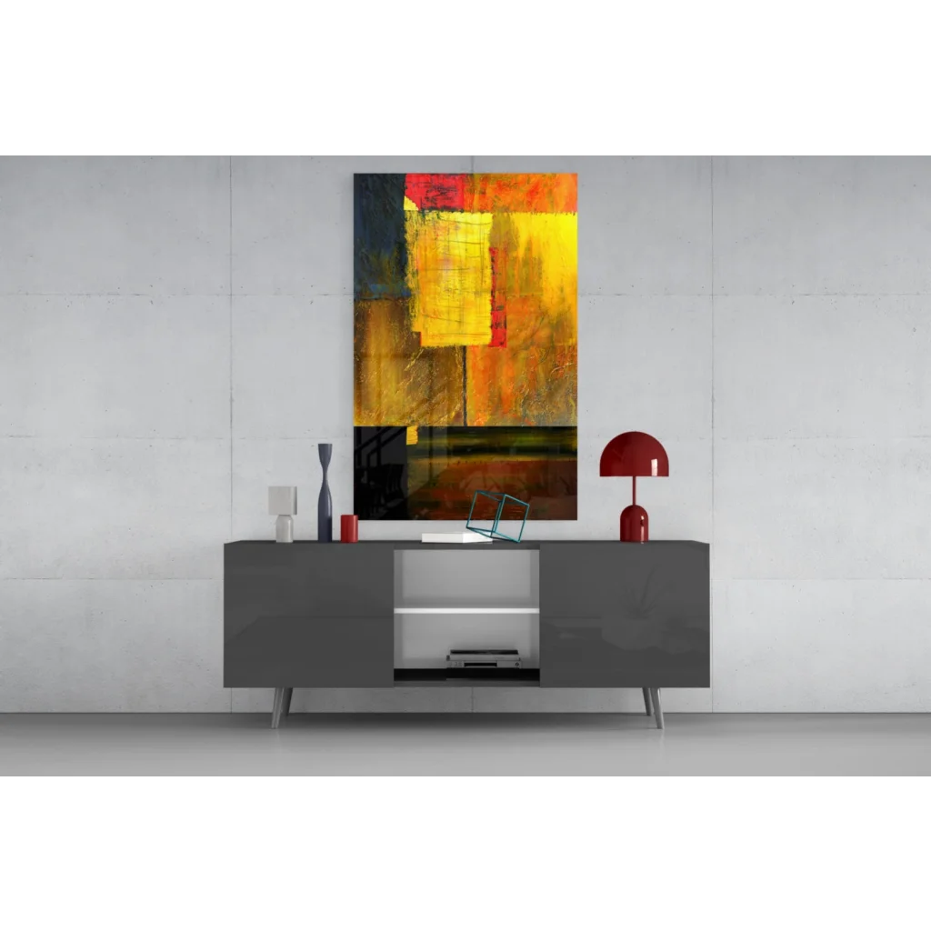 Vibrant abstract glass wall art in yellow, orange, red, black blocks