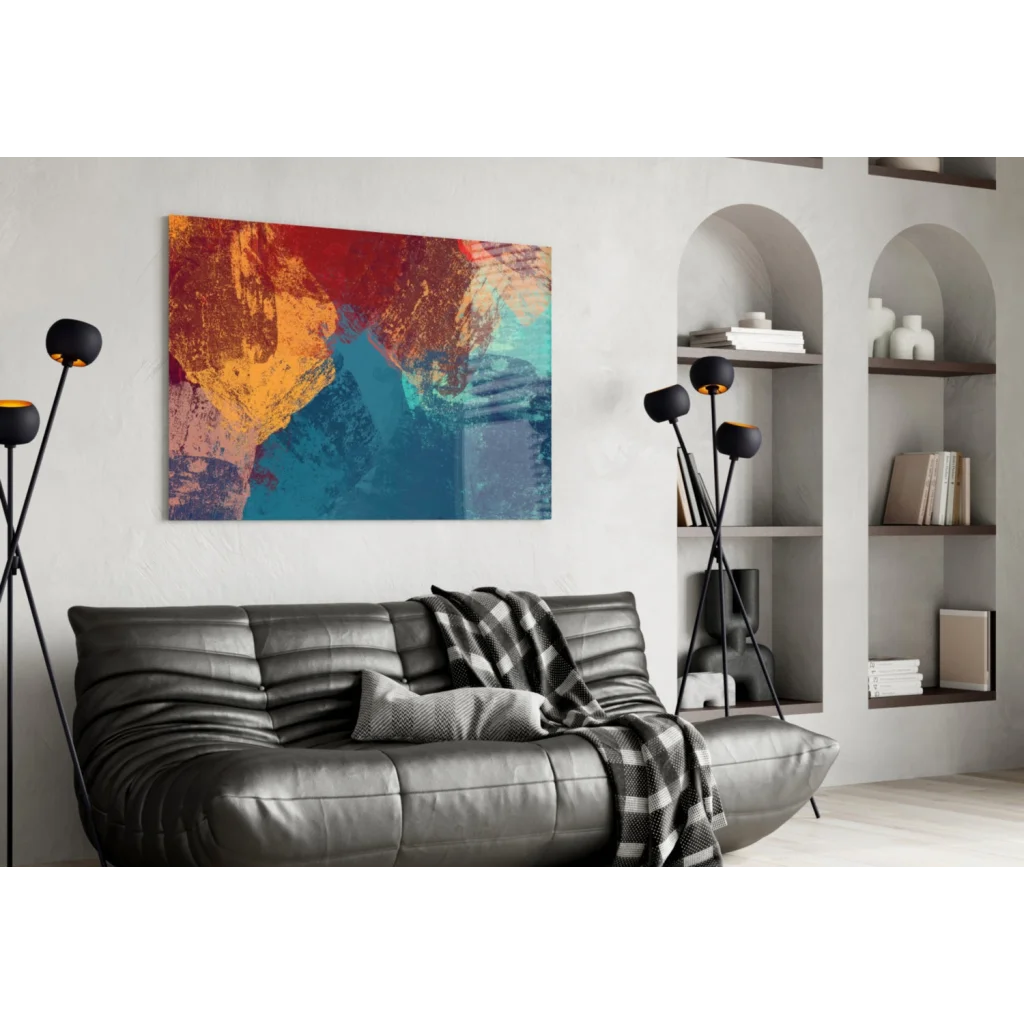 Vibrant abstract glass wall art with bold red orange teal strokes above sofa
