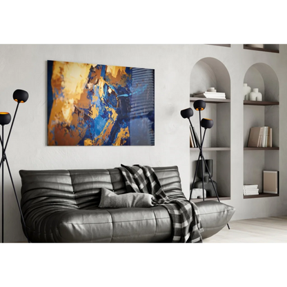 Modern black leather sofa with quilted texture and plaid throw, near bold blue and gold wall art