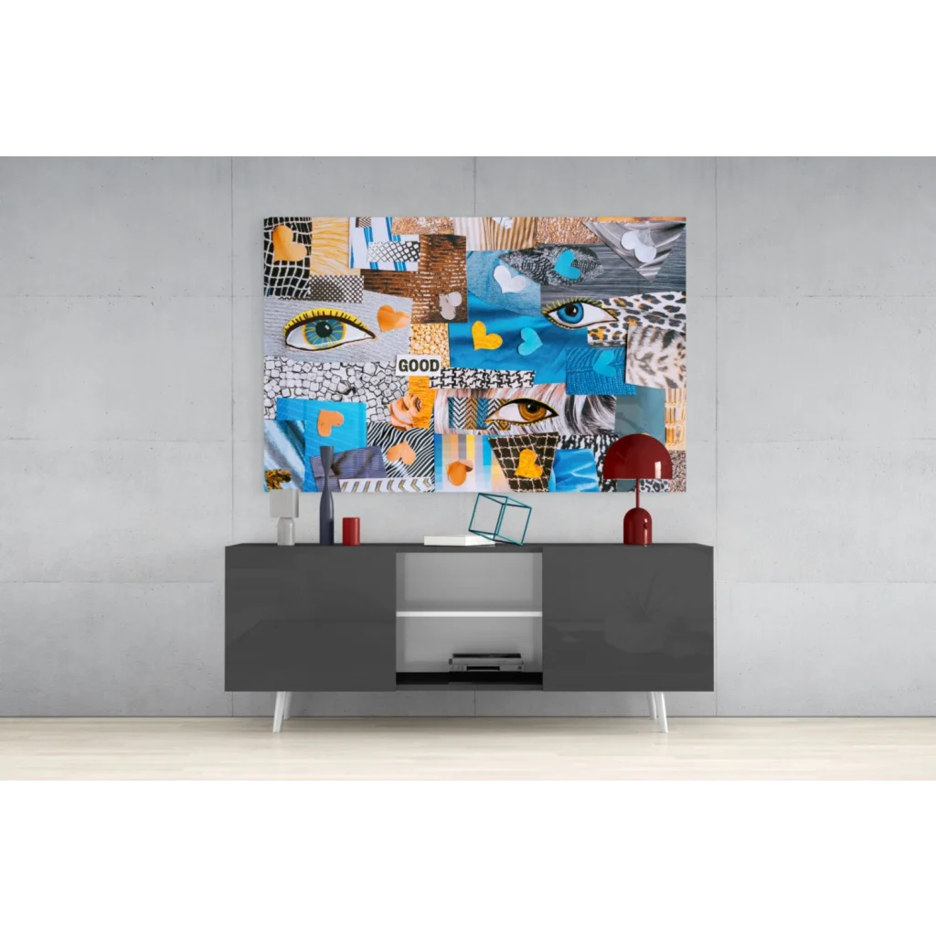 Vibrant glass wall art collage with bold blue orange eyes on black