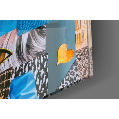 Vibrant patchwork glass wall art with bold eyes, textures, and orange heart