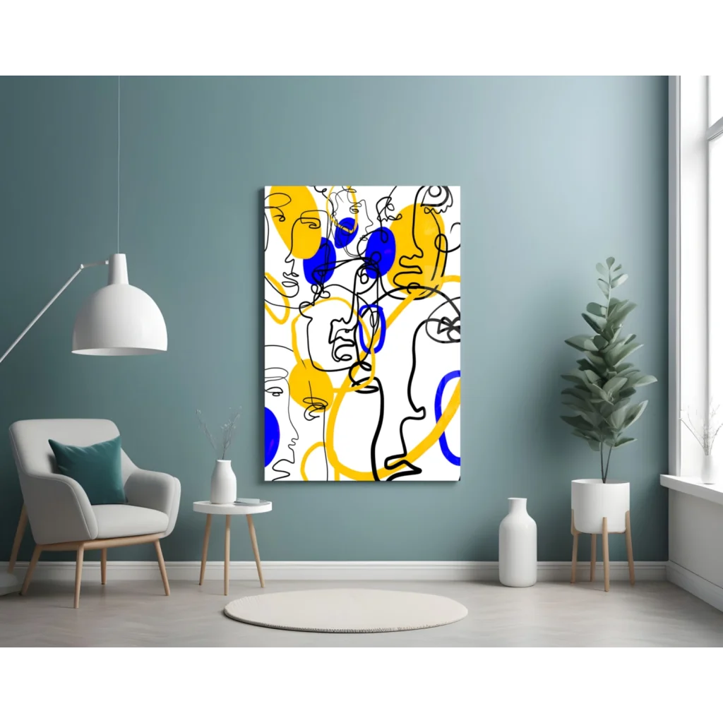 Bold abstract faces wall art in yellow and blue on white background