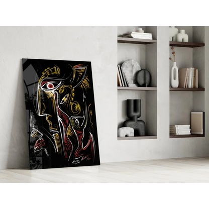 Bold abstract glass wall art with red gold lines and stylized faces