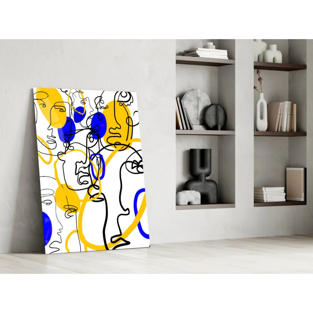 Bold yellow and blue abstract faces glass wall art on white background