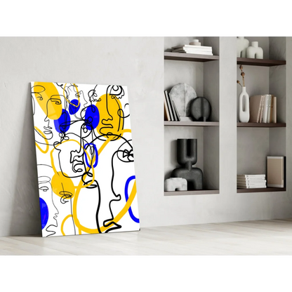 Bold yellow and blue abstract faces glass wall art on white background