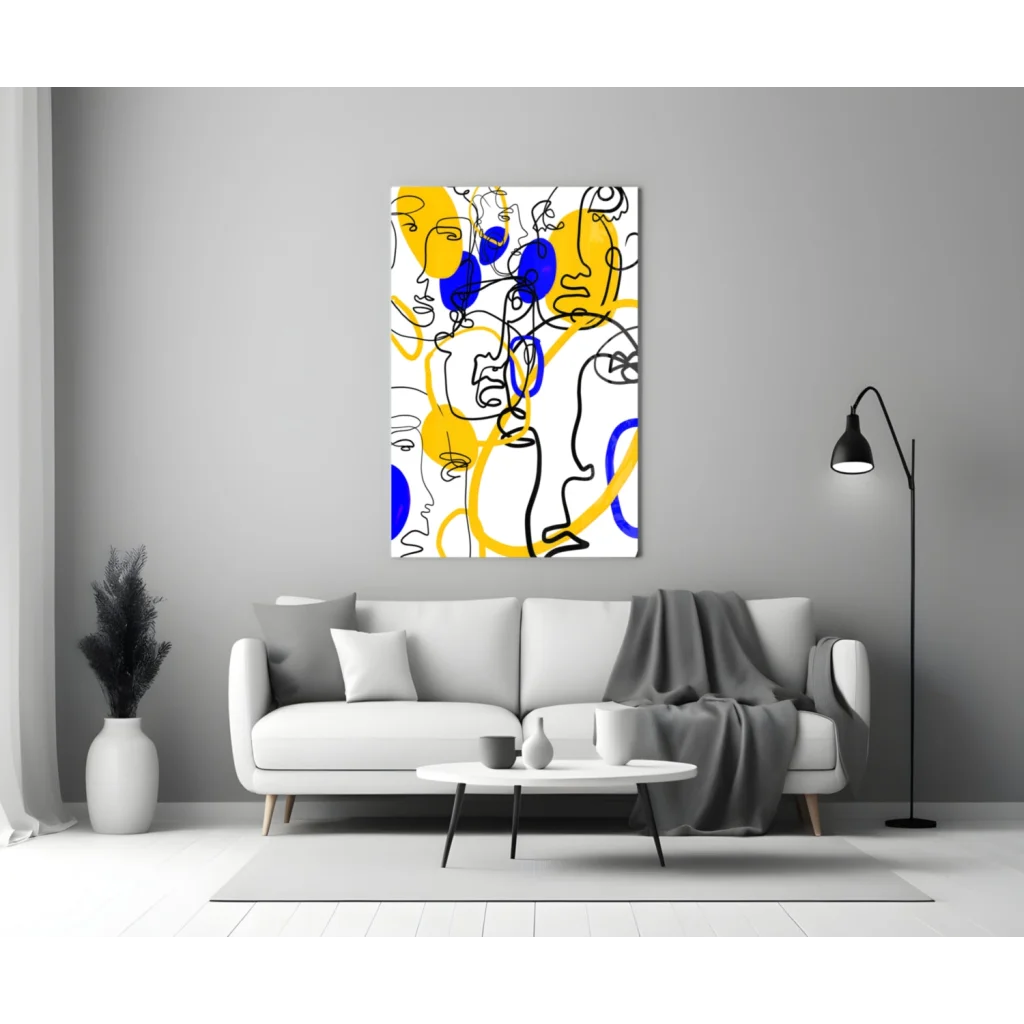 Bold yellow and blue abstract faces wall art on white canvas