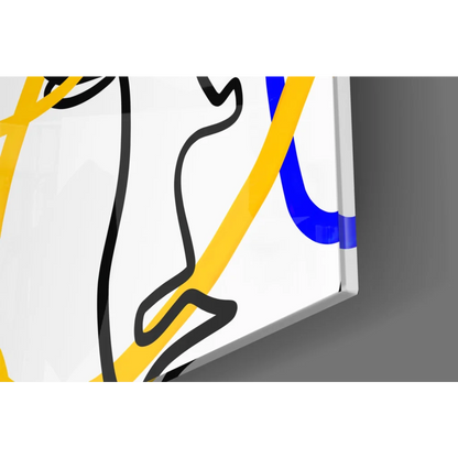 Bold abstract faces glass wall art with black, yellow, blue lines on white