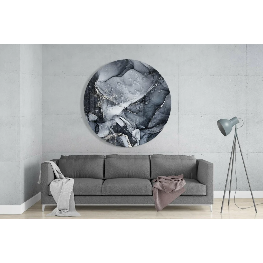 Swirling black and silver tempered glass art on wall