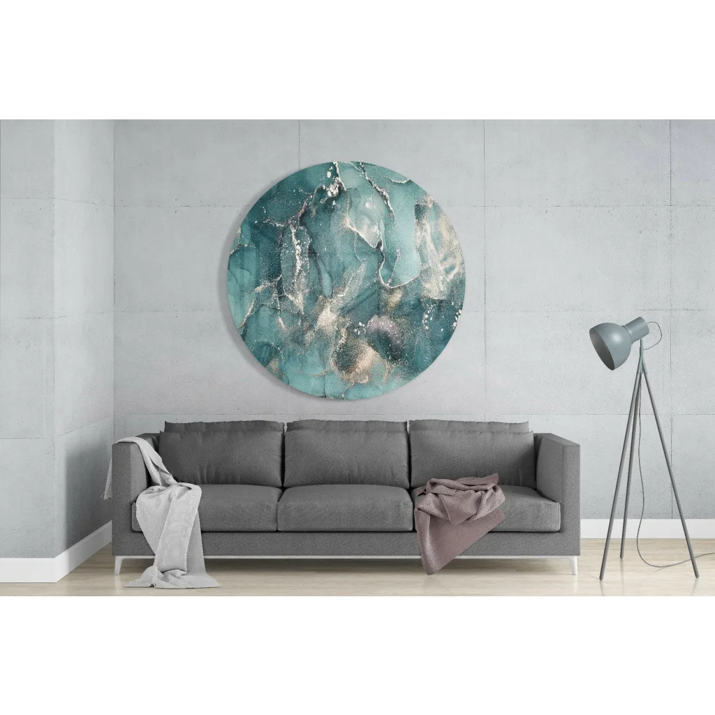 Circular teal and white tempered glass art on wall