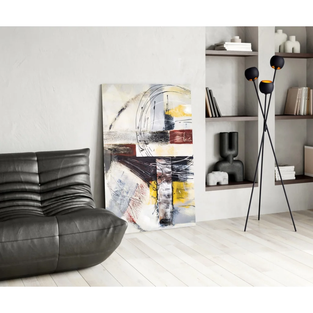 Black leather sofa under bold abstract wall art with yellow black strokes