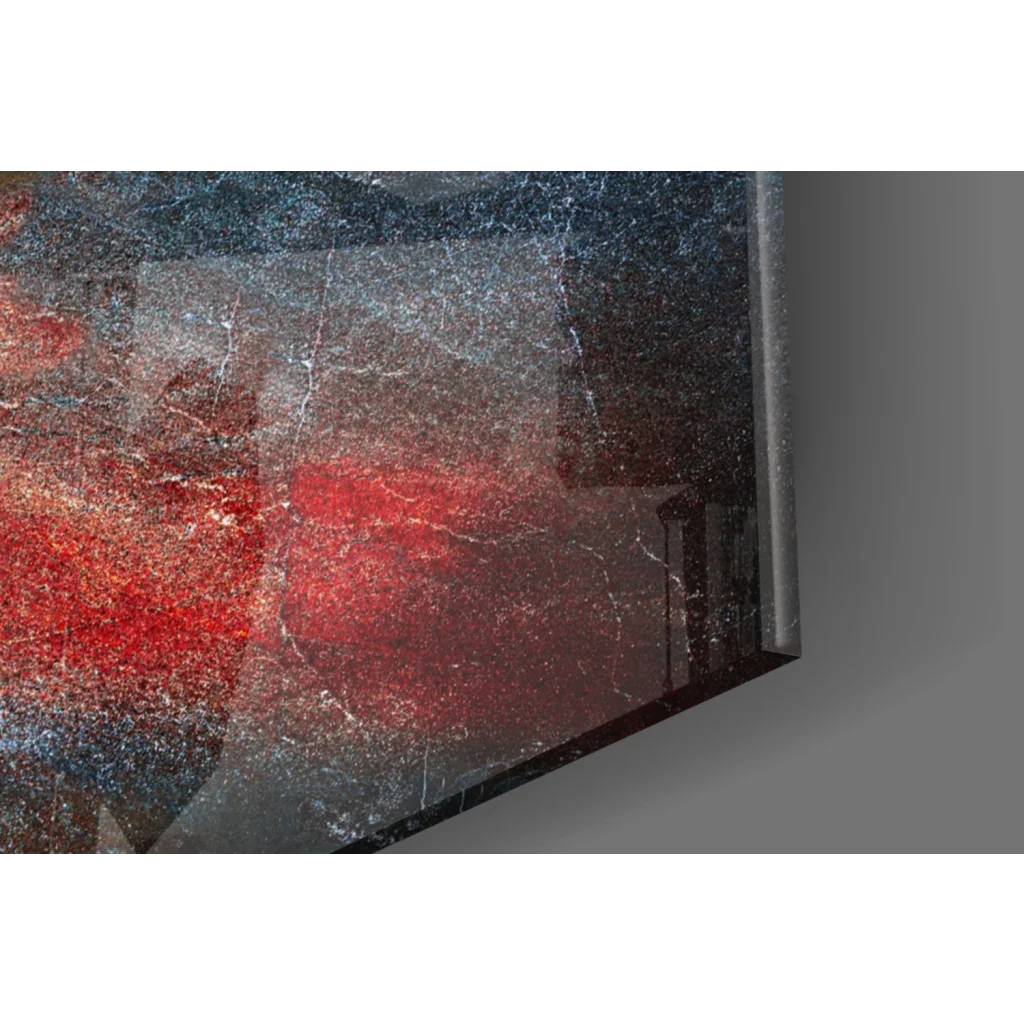 Sleek modern TV in thin frame shows fiery abstract glass wall art with bold red black swirls