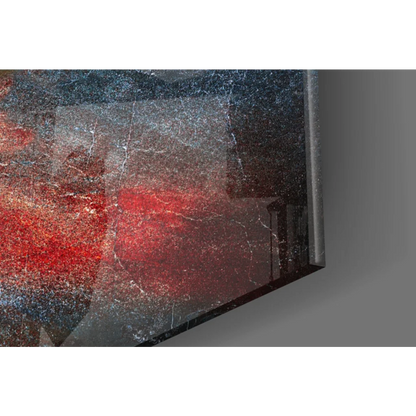 Sleek modern TV in thin frame shows fiery abstract glass wall art with bold red black swirls