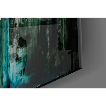 Bold teal and black abstract wall art on sleek modern monitor