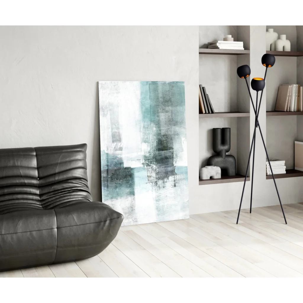 Teal abstract wall art with textured brushstrokes above black leather sofa