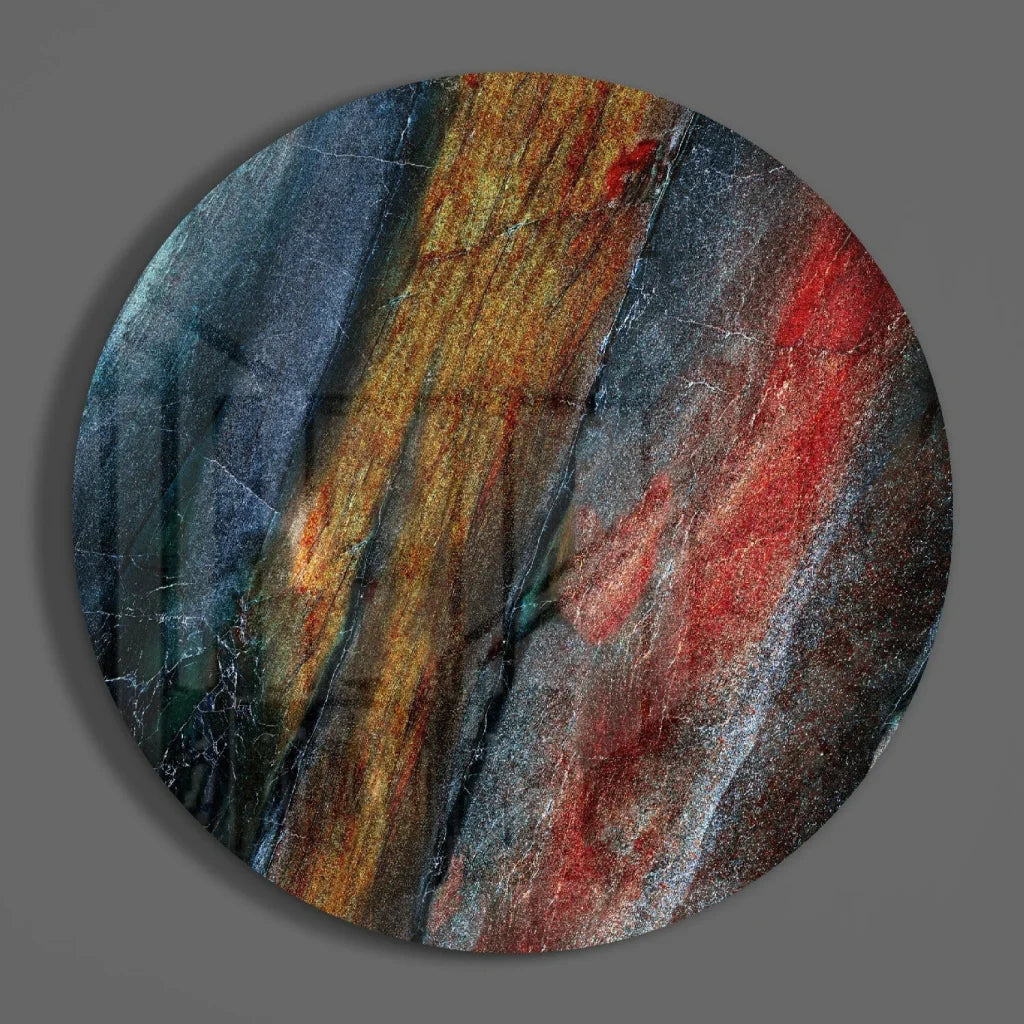 Fiery swirl tempered glass art with bold abstract colors in blue orange red