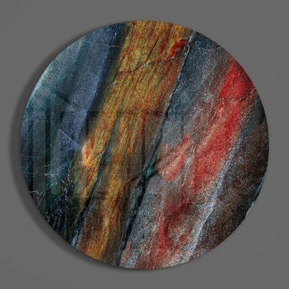 Fiery swirl tempered glass art with bold abstract colors in blue orange red