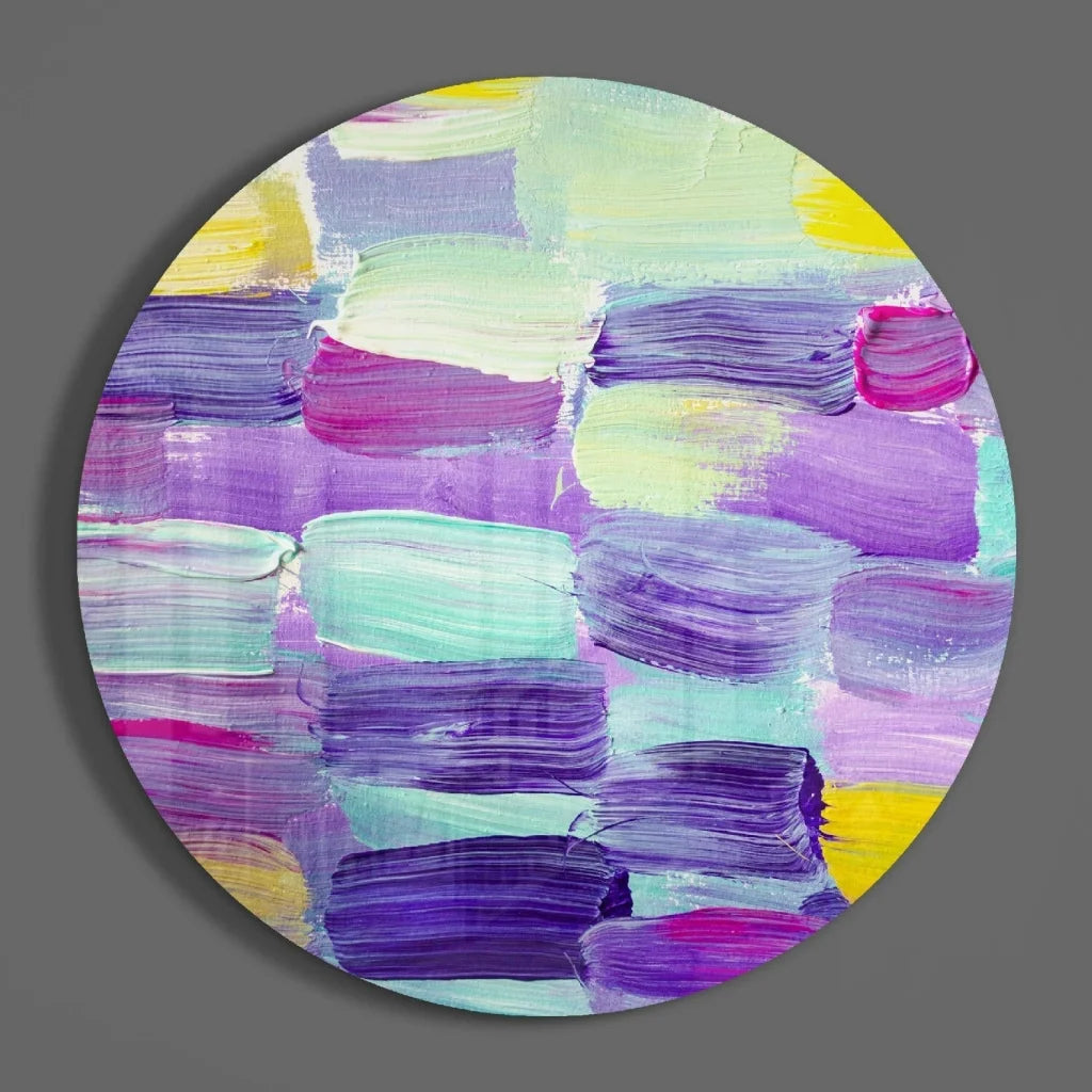 Vibrant circle tempered glass art with bold purple and pink swirls