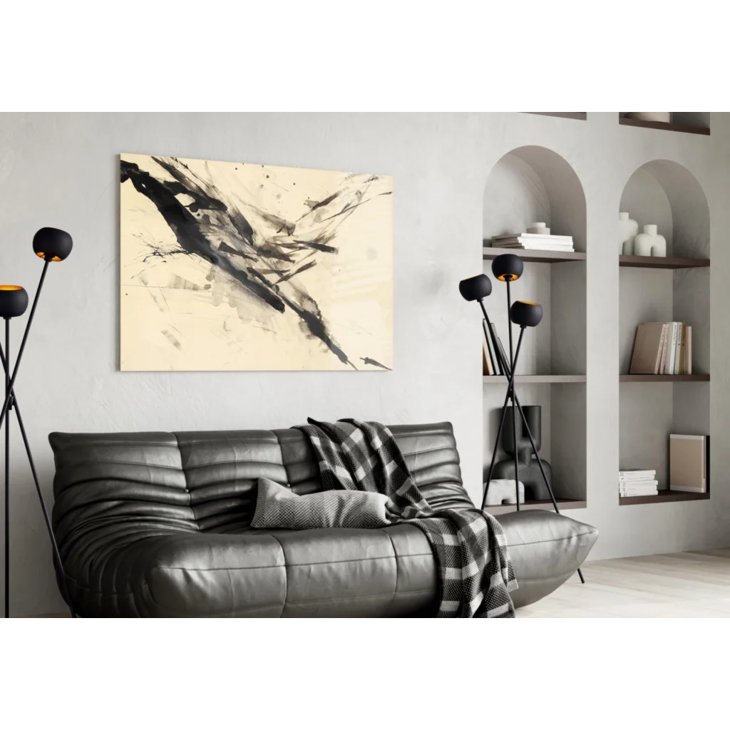 Bold black brushstroke abstract glass wall art over gray sofa