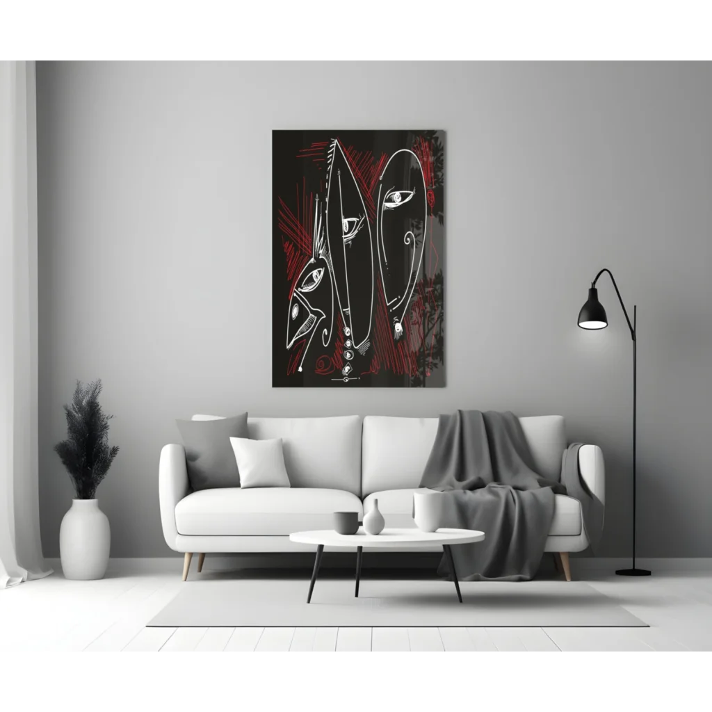 Bold red and black glass wall art with abstract faces