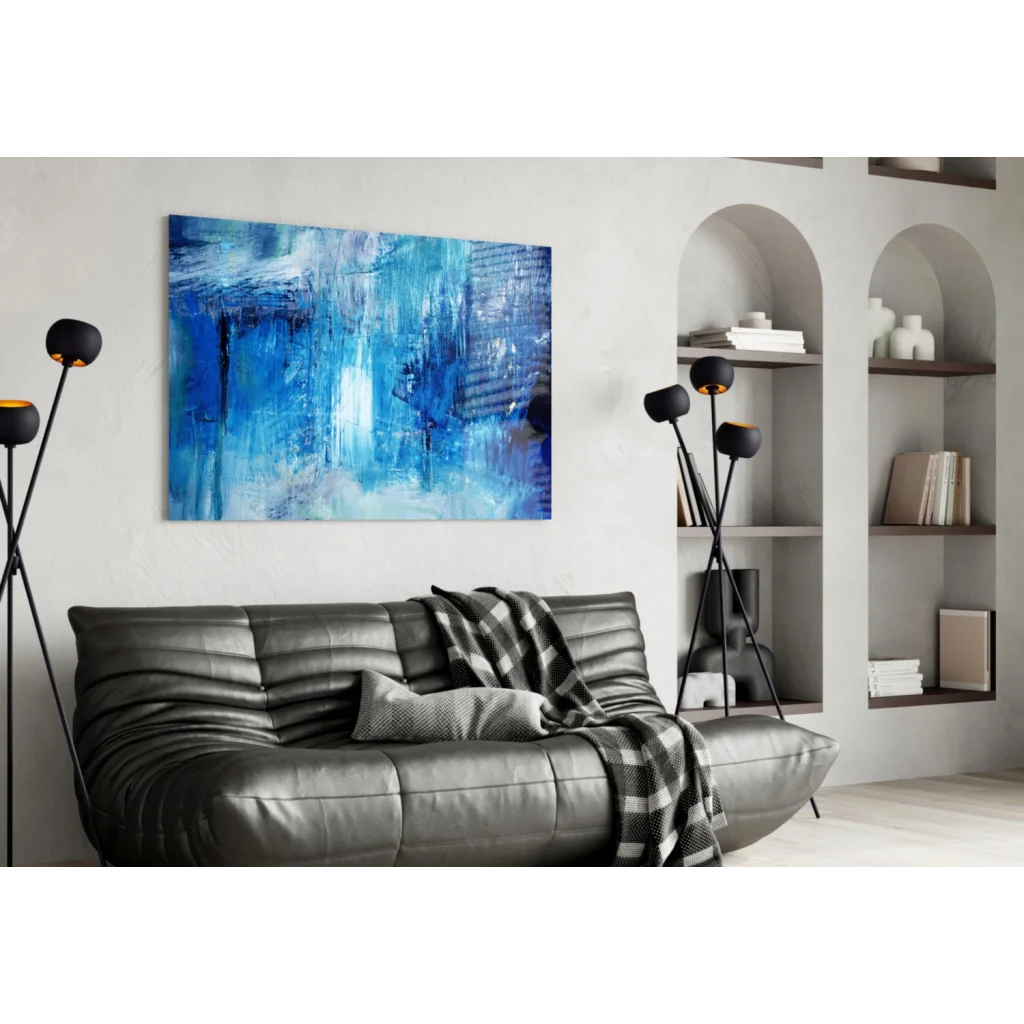 Bold blue textured abstract wall art canvas painting with white accents above gray sofa