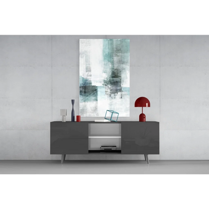 Teal abstract canvas wall art with textured brushstrokes above gray console