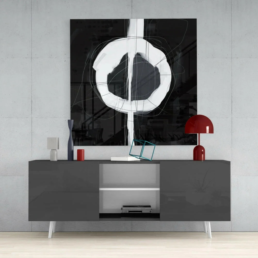 Modern gray sideboard with sleek minimalist design and white tapered legs under stunning glass wall art
