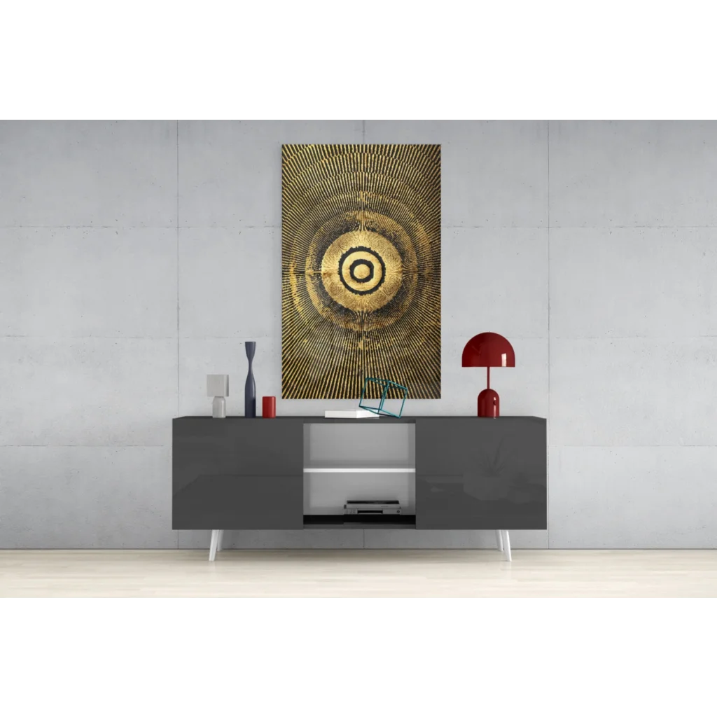 Golden concentric circle glass wall art with textured black-and-white target