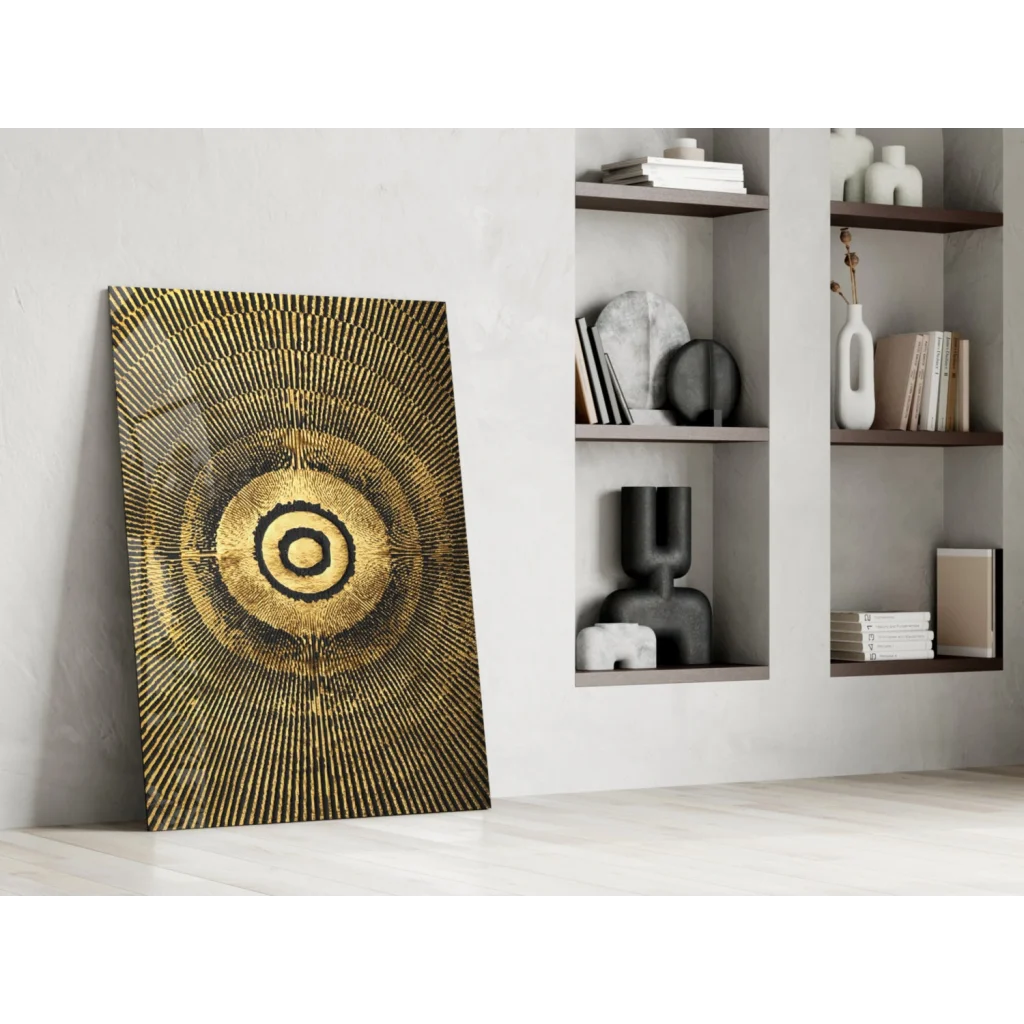 Golden concentric circle glass wall art with black ring center