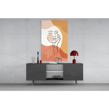Modern minimalist gray sideboard with sleek silver legs and abstract orange face wall art