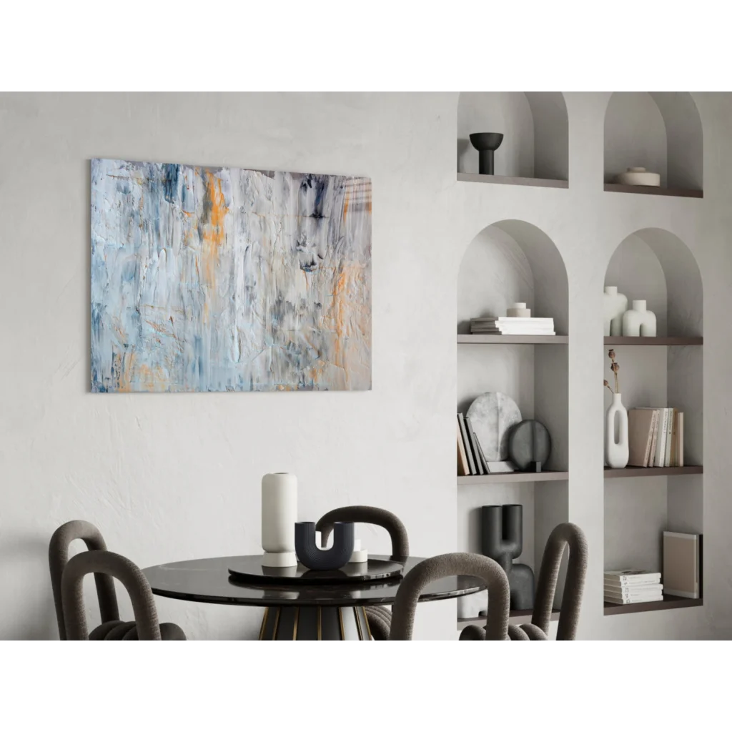 Textured abstract canvas wall art in soft blue, gray, and warm ochre tones