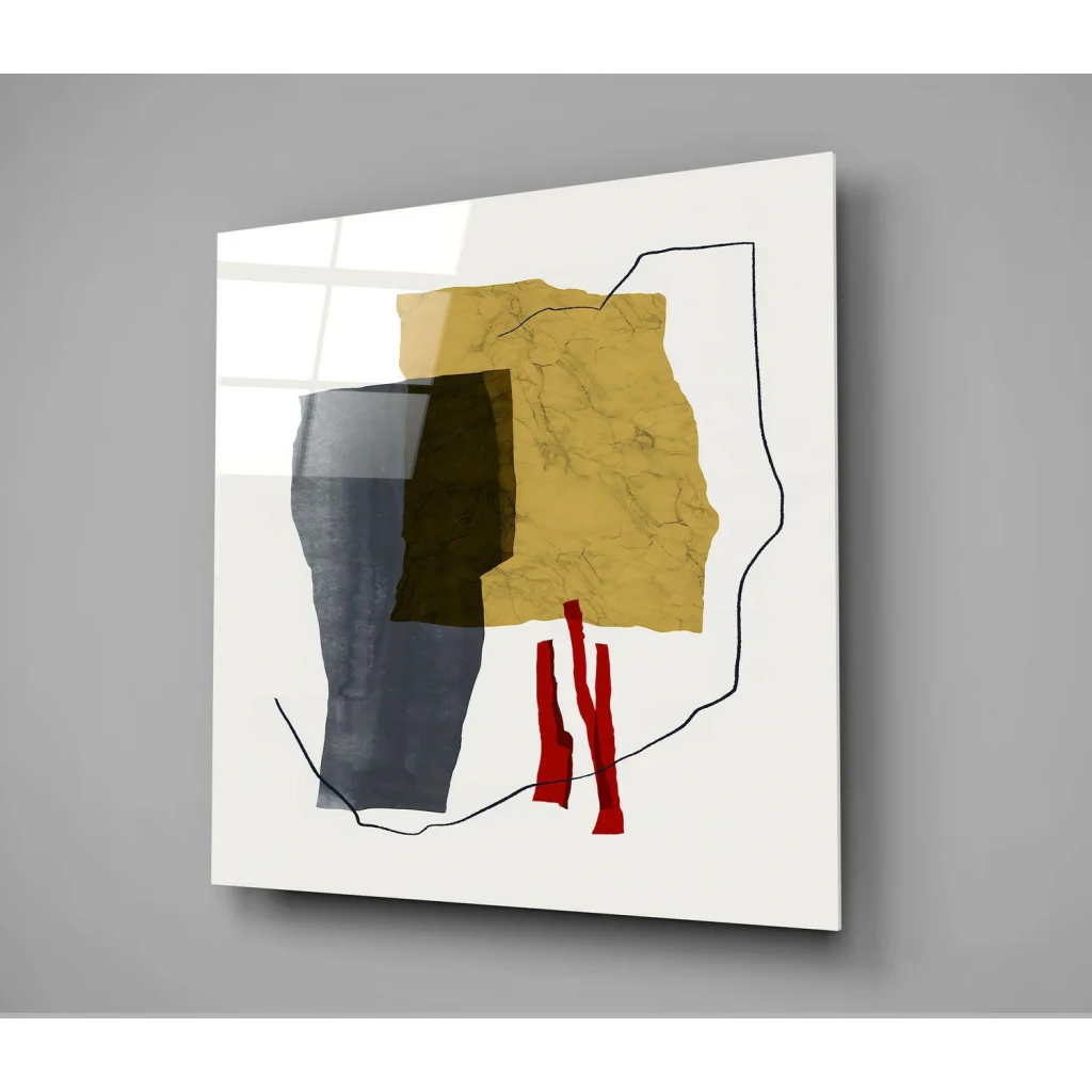 Bold geometric glass wall art in gold, red, and gray