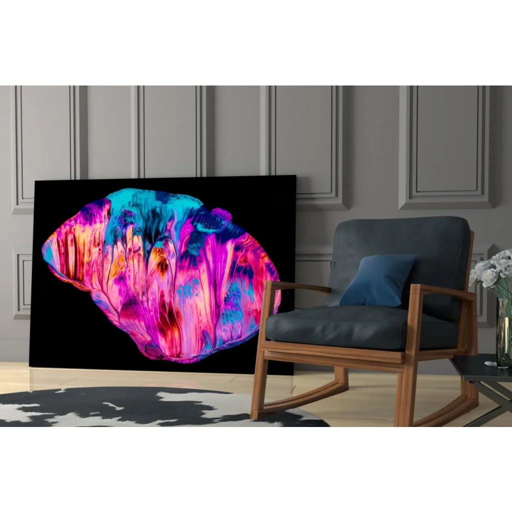 Vibrant swirling cosmic glass wall art in psychedelic pink, blue, purple hues on black