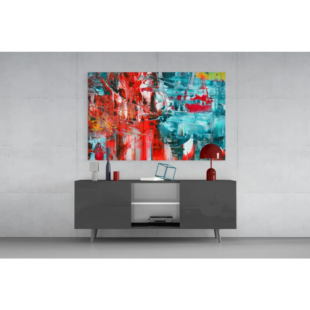 Vibrant abstract tempered glass wall art with bold red, teal, yellow reflections