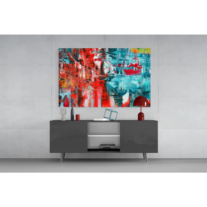 Vibrant abstract tempered glass wall art with bold red, teal, yellow reflections