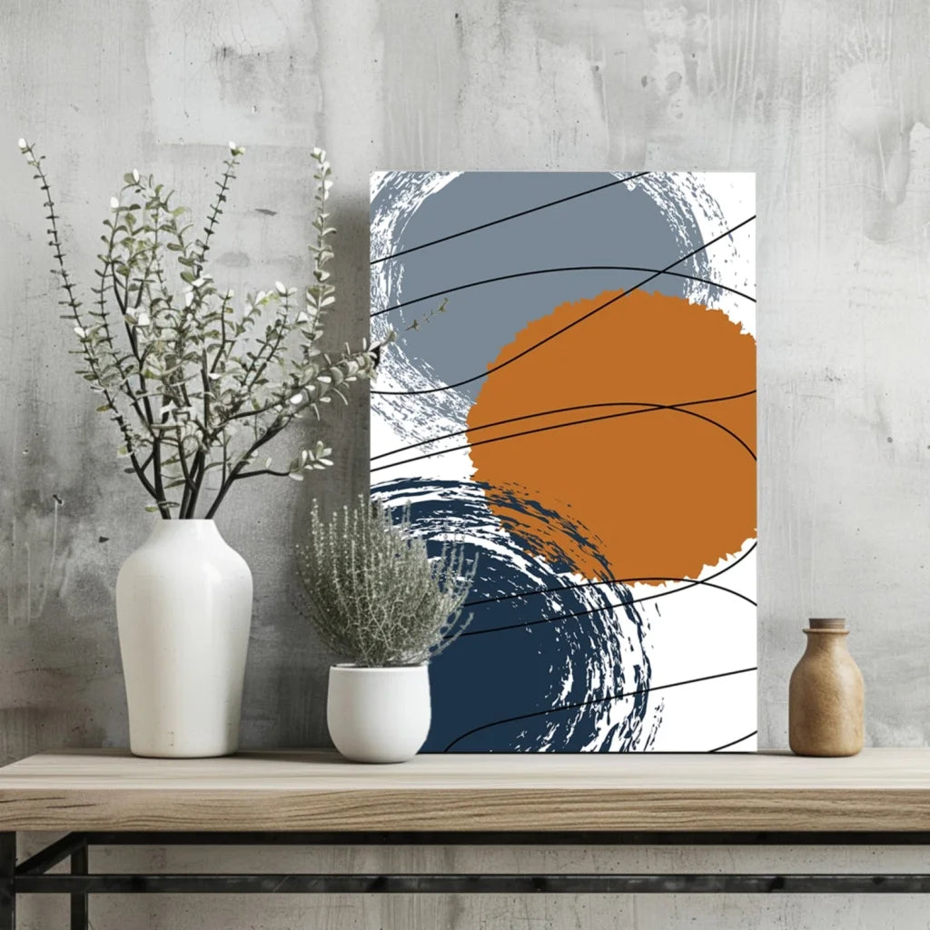 Bold abstract Insigne aluminum prints in orange, navy, and gray
