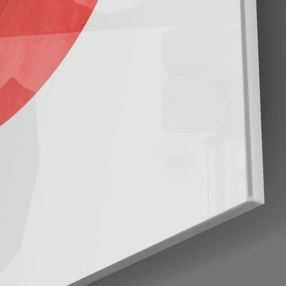 Bold red circular glass wall art in white frame