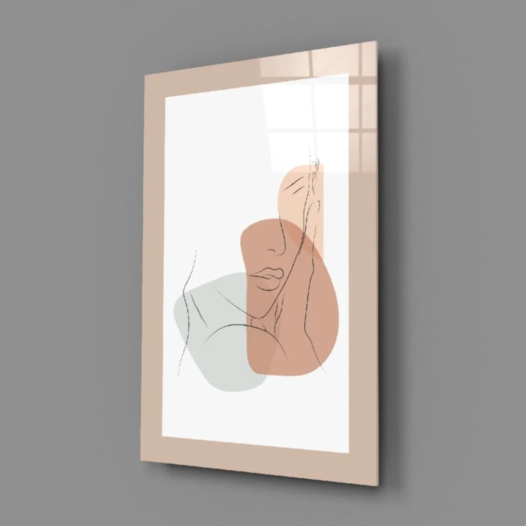 Peach and green abstract face wall art print in beige frame