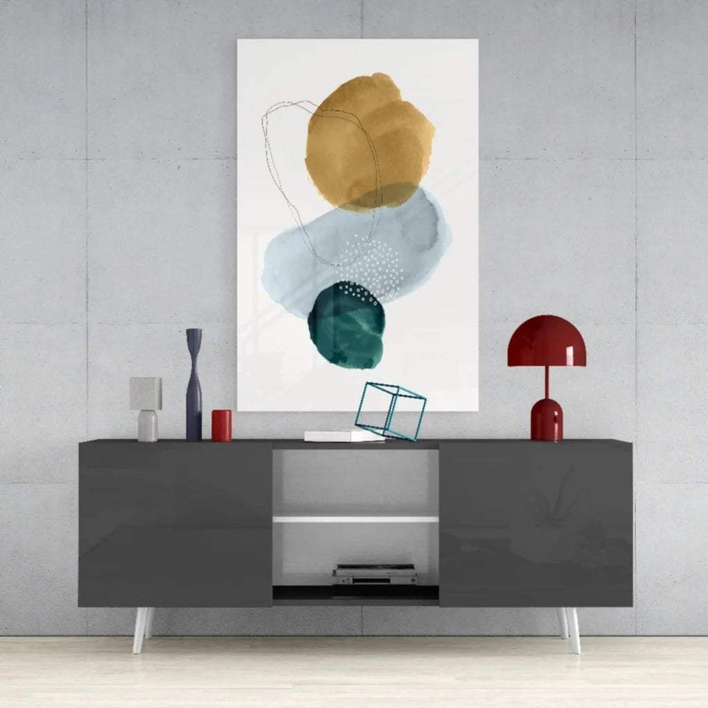 Stunning glass wall art of abstract watercolor circles in gold, teal, blue