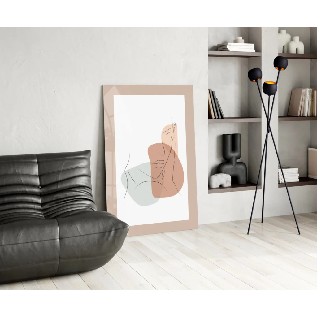 Peach and green abstract face wall art print in beige frame