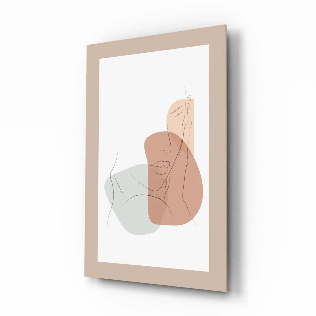 Peach and green abstract face wall art print in beige frame