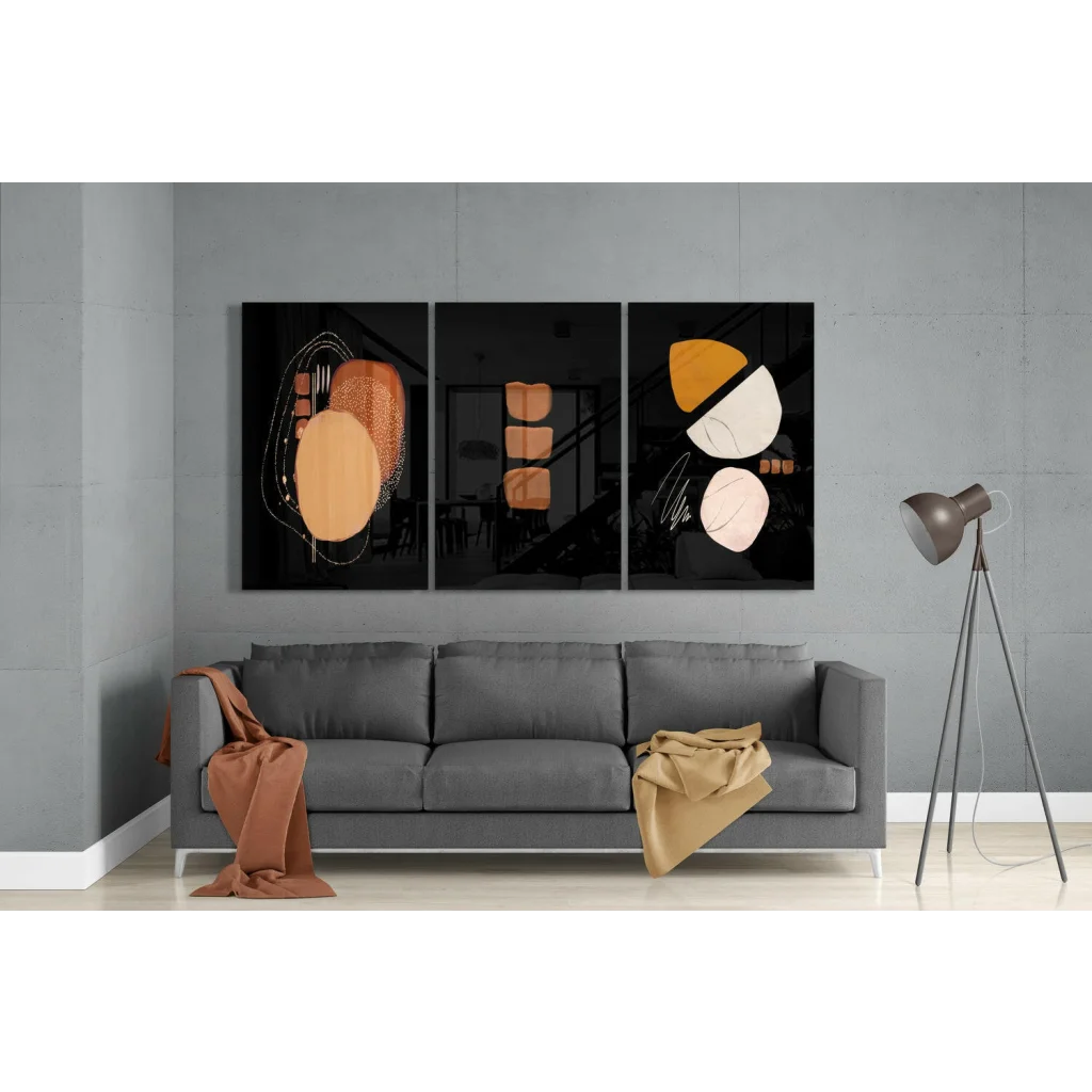 Stunning amber and black glass wall art triptych with bold geometric shapes